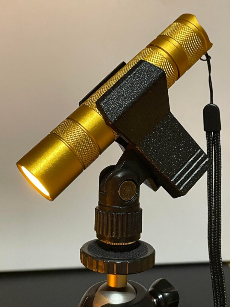 Pro tip: A mic clamp makes a great flashlight stand