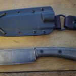 Esee 6, semi customized. I reprofile the edge and did a forced patina.