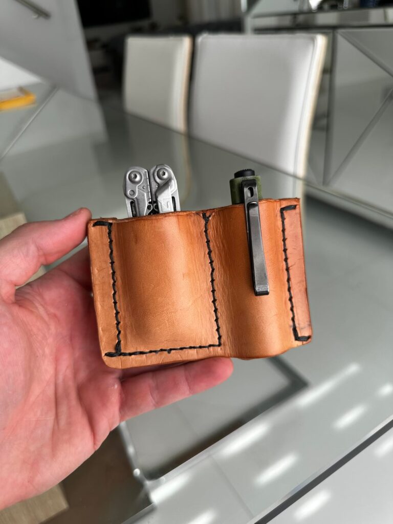 First attempt at a EDC Pouch. It ain’t pretty, but it works
