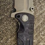 I bought this Artisan Cutlery Proponent on the swap. Everything checks out, but no logo??