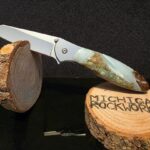 BC Ocean Picture Stone on a Random Leek