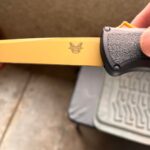 Bought this for $20 from a guy who said he found it at an estate sale. Is it real? Benchmade Shootout FDE Tanto