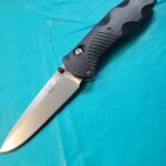 What knife isn't your favorite but still gets used/carried regularly? I'll start: