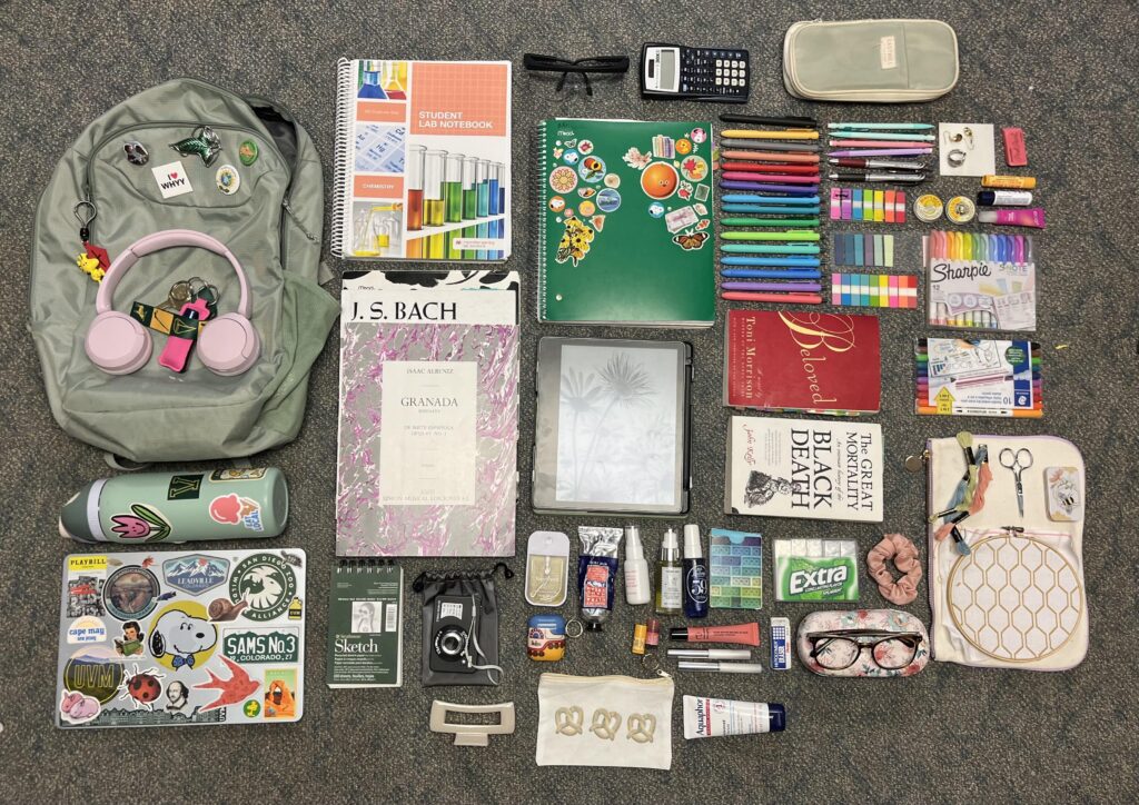 The bag of an overworked college student with too many pens