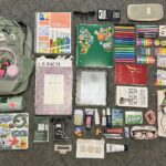 The bag of an overworked college student with too many pens