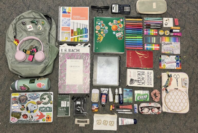 The bag of an overworked college student with too many pens