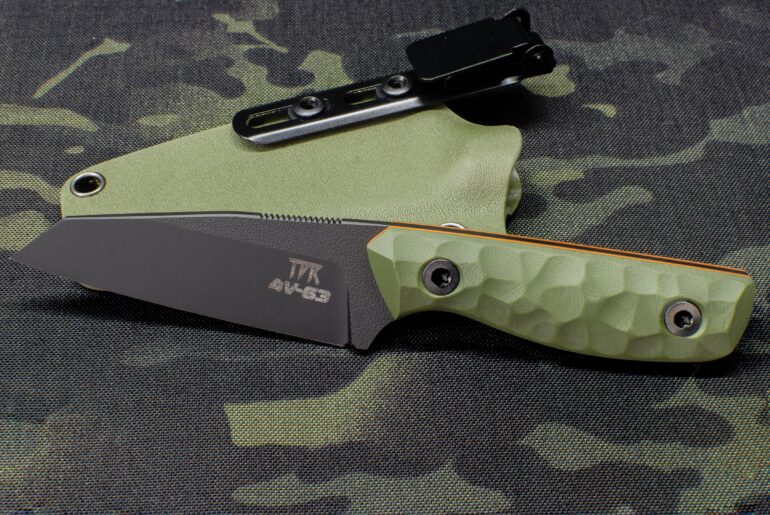 CPM 4V wharncliffe, one of my favourite smaller designs. Black Cerakote, OD G10, orange liners