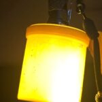 Jury rigged lantern attachment from a candy container.