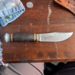 Need some help guessing the age of two knifes