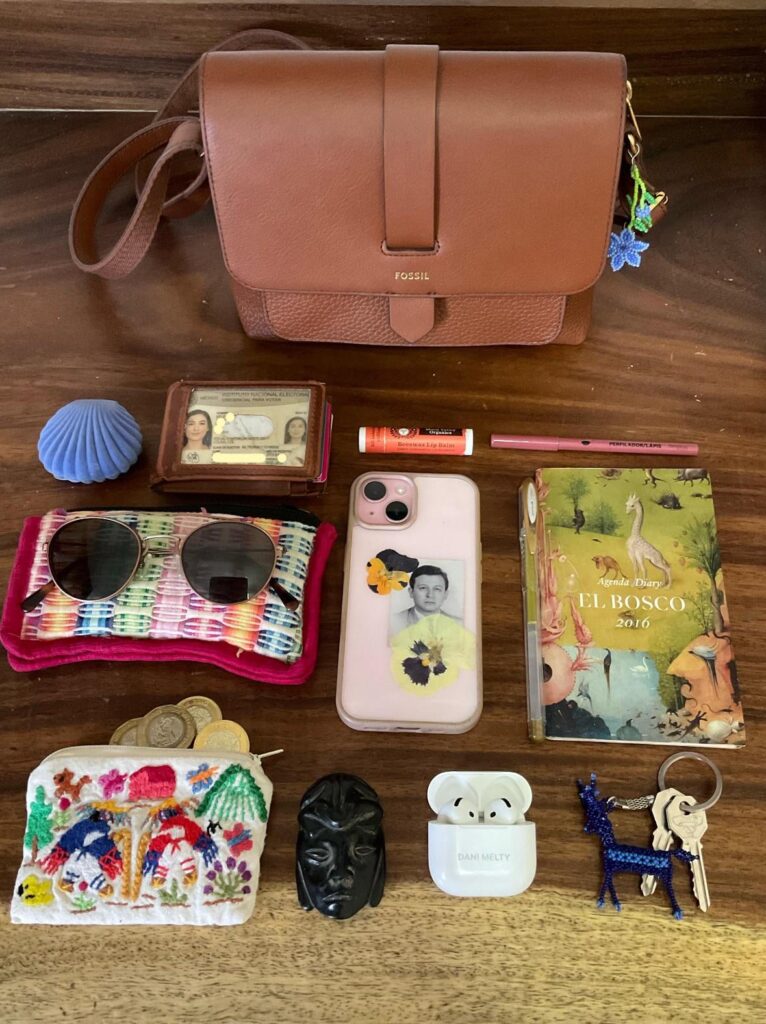 New purse. Old goodies 🌼