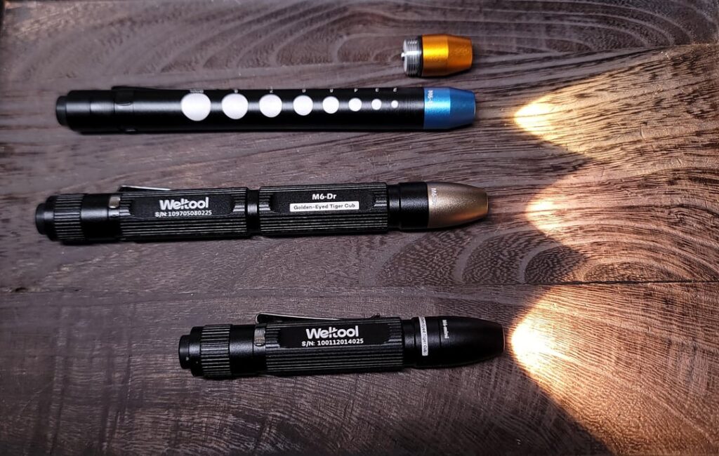 A few of the Weltool M6 series pen lights - beams and color measurments