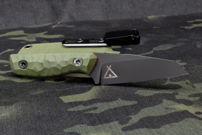 CPM 4V wharncliffe, one of my favourite smaller designs. Black Cerakote, OD G10, orange liners