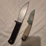 My friend broke my ESEE 4 and bought me this 3V Master Hunter...