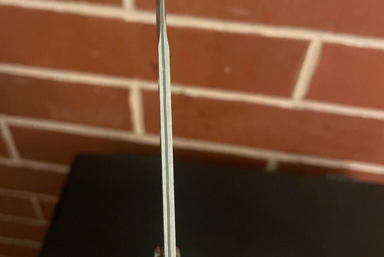 Question about my AKC. Is this real Damascus? Is there usually a line going down the middle of blade’s spine? This is my first Damascus knife 🤷‍♂️