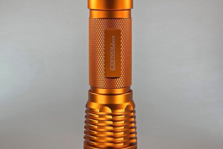 I call it the "Orange Dream Machine." Convoy M21B, SFT-42R 6500k, EVE INR21700-58E 5700mAh