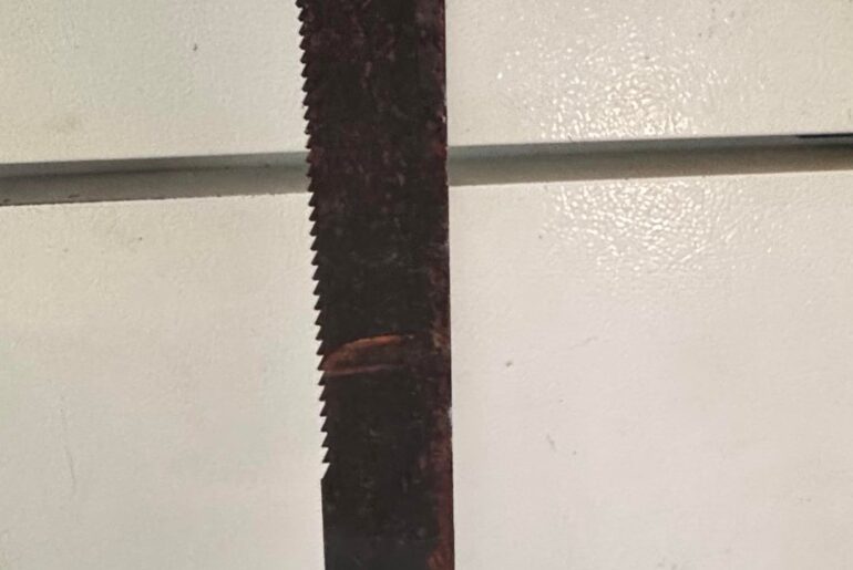 Bought an old machete at an estate sale. Best way to remove the rust and tighten a rivet?