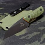 CPM 4V wharncliffe, one of my favourite smaller designs. Black Cerakote, OD G10, orange liners