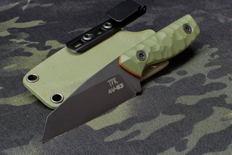 CPM 4V wharncliffe, one of my favourite smaller designs. Black Cerakote, OD G10, orange liners