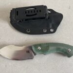 Please help me identify this knife (make, model, anything)