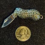 Alright, here's the dumbest knife that I own. What's yours?