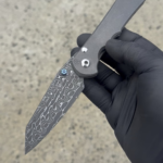 Custom Damascus blade on a CRK Inkosi