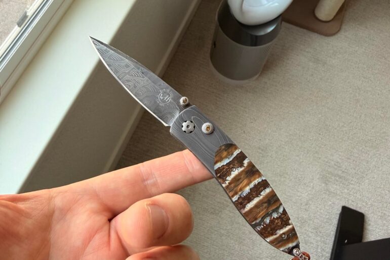 Knife I was given today. William Henry, Damascus with Woolly Mammoth Tooth Inlay and Citrine Gemstones