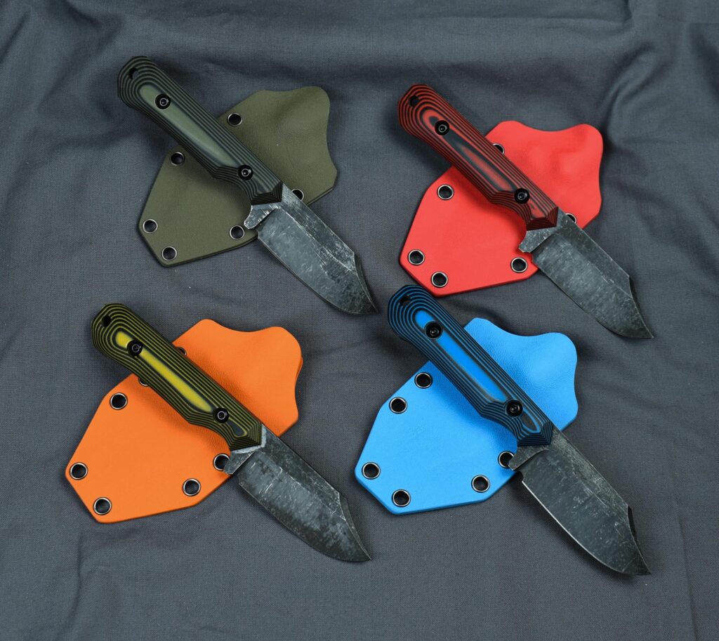 Frontline Minis. Stonewashed 1095 at 60HRC, bicolour G10 scales and kydex sheaths.