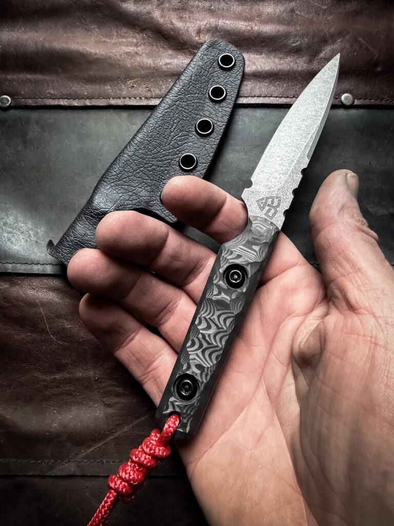 Freshly made N690 EDC with CF scales in Kydex sheath