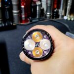 I got a fireflies e04 from my friend but the optic is quite weird. Is this a stock optic?