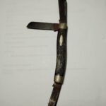 Advice on cleaning this vintage Ulster USA knife without taking it apart