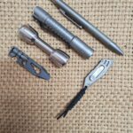 Ink Pen / Ti Pineapple mini from Rey Light / Fidget dumbbell from Jodozorn / Prybar from Titaner / Mini Cutter