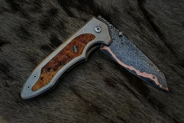 Here's 2 full customs I made. Do you guys prefer a Cu Mai or damasteel blade?