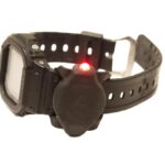 Wristwatch band mounted LED flashlight