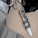 Didn't want to buy a sea beacon, so I repurposed my Manker E-05 II and strapped it to my vest