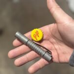 Ti bottle opener... I mean flashlight er...multitool?