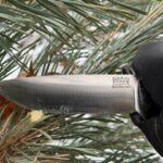 Gentleman, my Bravo 1 in "Magnacut" developed patina after cutting some twigs