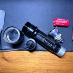 Can anyone help me identify this old surefire?