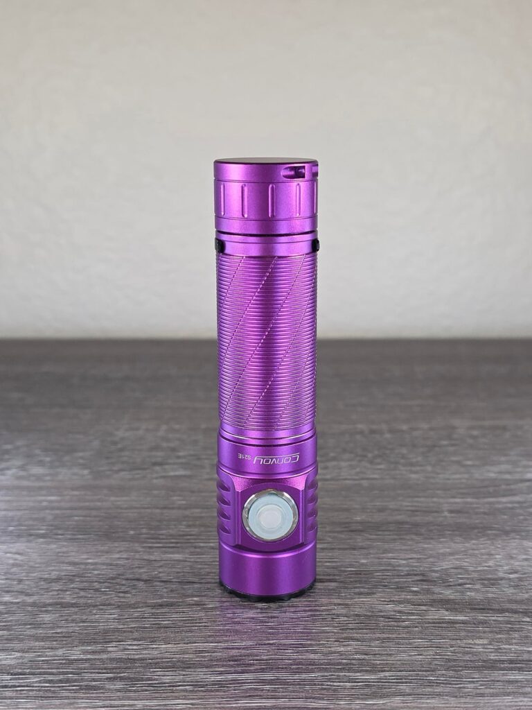 NLD Convoy S21E, XHP50.3 HI R70 5000K, Molicel P50B, and black bezel. Beautiful flashlight ruined by a horrible green tint. See beam shots.