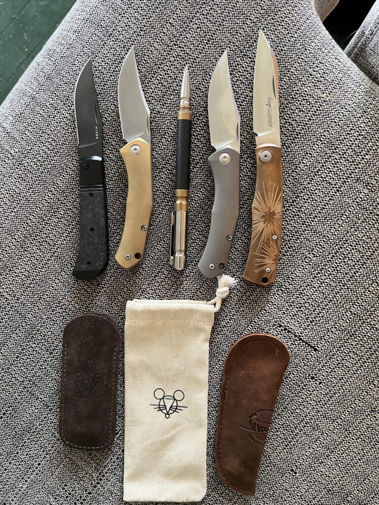 Four knives and a pen