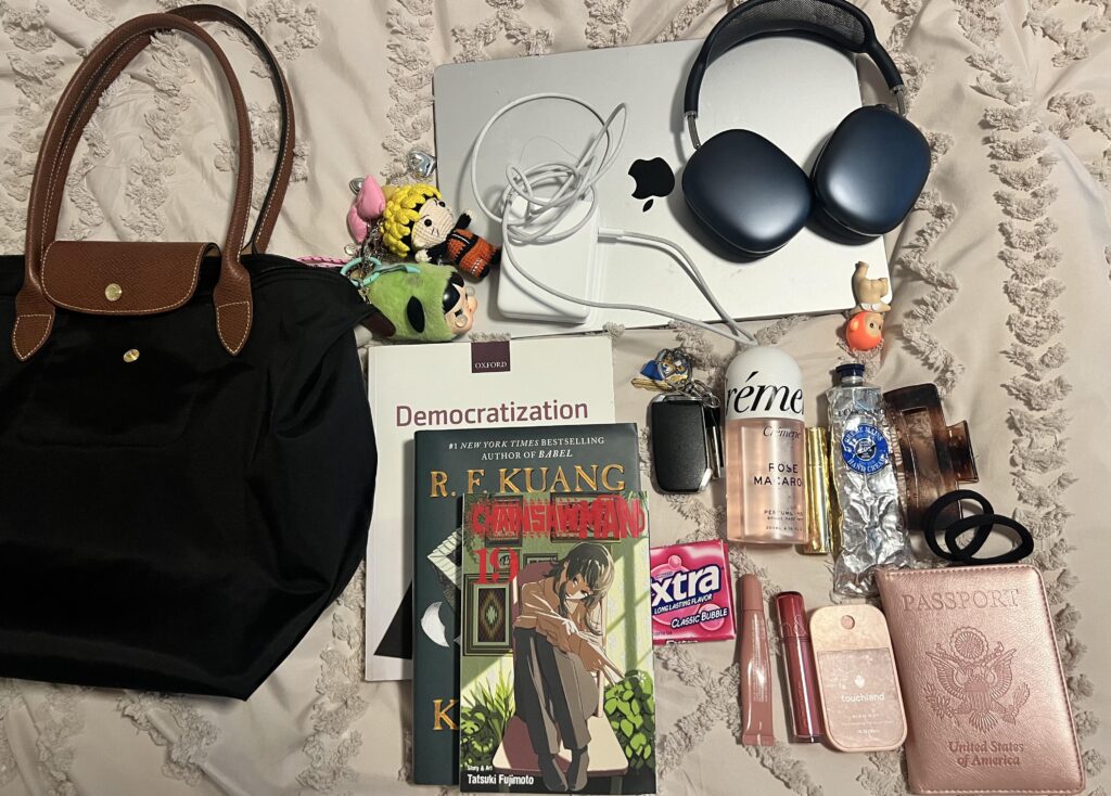 What I have packed for class today **Ive been using my passport holder as a wallet out of pure laziness