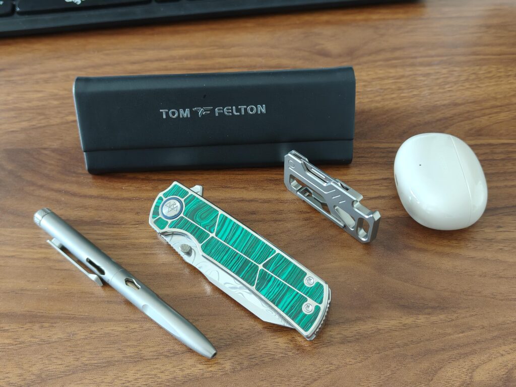 Today’s EDC carry. Anyone else carrying something that stands out this much?