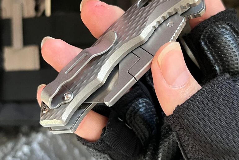 TGZUO Q53 titanium side-open utility knife, tool-free blade changes.