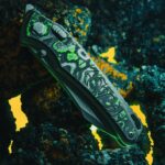 Hawk Knives Talon in M390 with Titanium frame and toxic boss carbon fiber inlays.