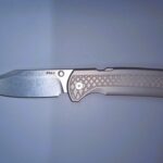 New Cold Steel FM-1 with Clip Point blade. Exactly as the original Drop Point one, exact weight and same detent/lock, just a different blade. (Original FM-1 and a Batarang for scale)