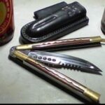 Handmade balisong brought back from the Philippines. Dunno the maker's name. Gary Graley made the custom sheath!