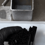 Forging a snowflake pattern damascus knife. Credit: Lewis Griffin