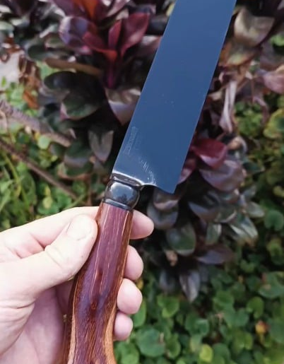 Working on a gaucho knife.