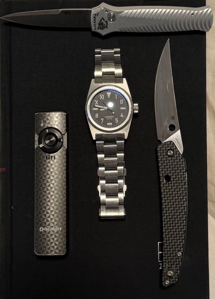 Today I’m carrying the O-Light Arkfield, Unimatic U2-H on Unimatic Stainless Steel Bracelet, Spyderco Ikuchi, and Titanium Piranha switchblade with S30V bayonet blade. The Spyderco is great for a traveling food prep knife!