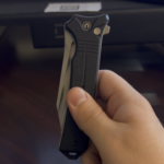 Managed to lose my button lock spring while cleaning so I temporarily replaced it with a pen spring. Now I can do this scary little trick