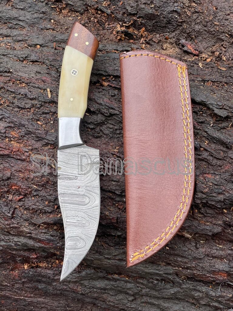 Just finished this Damascus skinner – camel bone & wood handle
